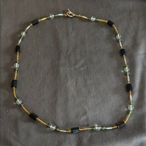 Glass bead necklace.